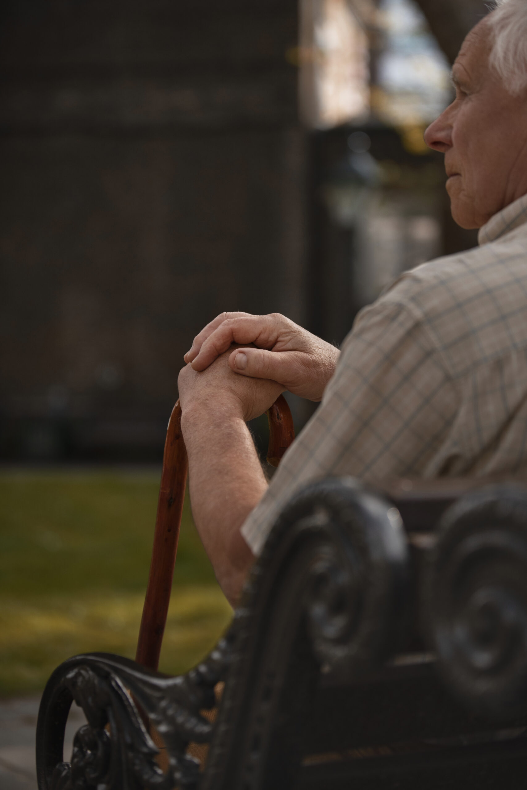 side-view-old-man-sitting-bench